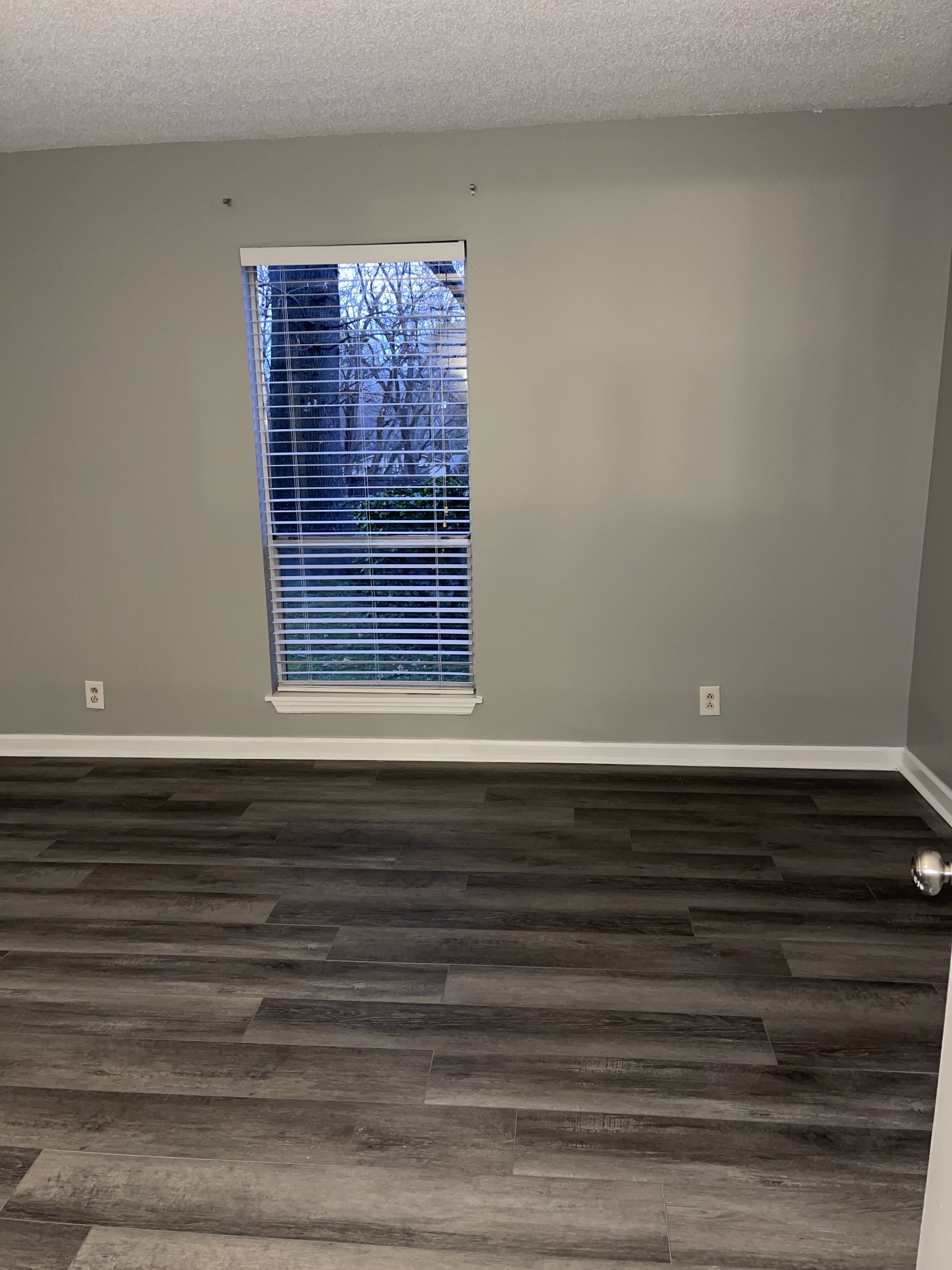 500 Paragon Mills Road, Unit N7 Nashville, TN 37211 - Photo 16 of 21 a view of wooden floor and windows in a room