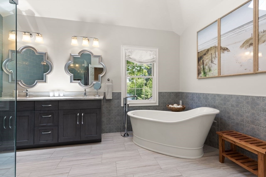 9 Bragg Road Foxboro, MA 02035 - Photo 24 of 42 a bathroom with a double vanity sink mirror and bathtub
