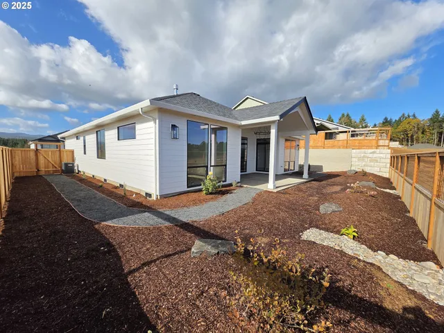 a view of a balcony with lake view and a floor to ceiling window