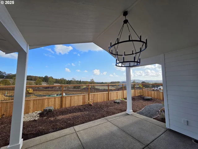 a bed room with furniture and a ceiling fan
