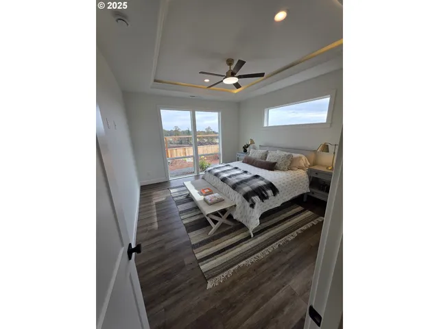 a bathroom with a toilet a sink and a mirror