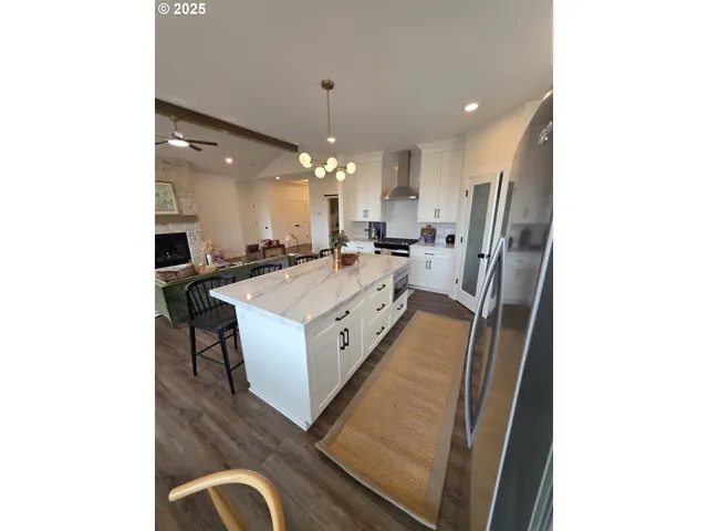 a kitchen with a stove and a sink