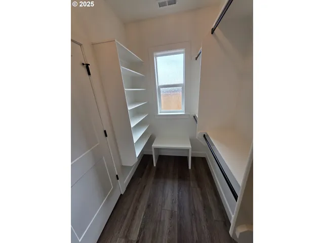 a picture of a room with a white wall and white walls