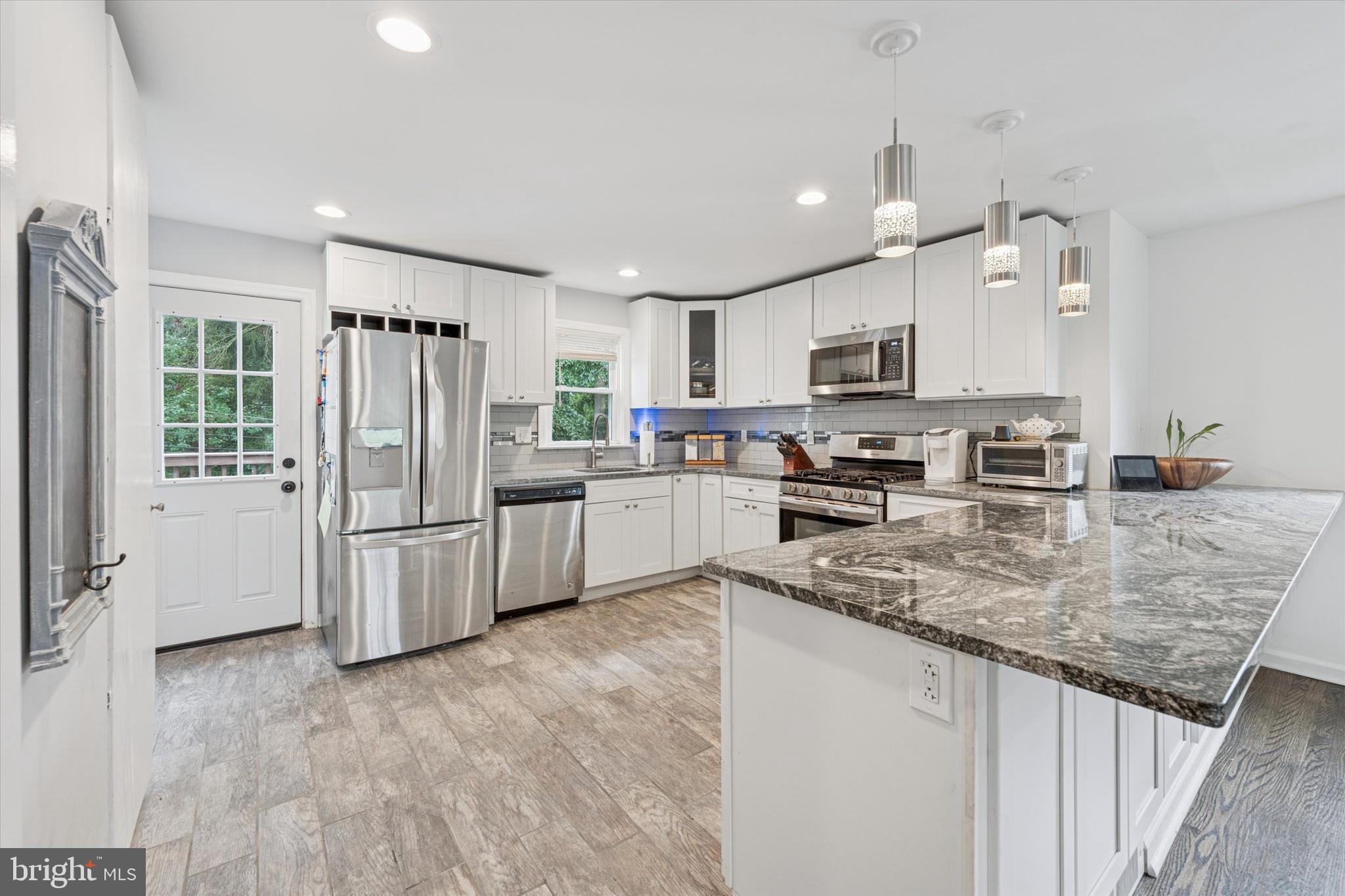 304 Providence Road Morton, PA 19070 - Photo 8 of 40 Beautifully updated kitchen with granite
