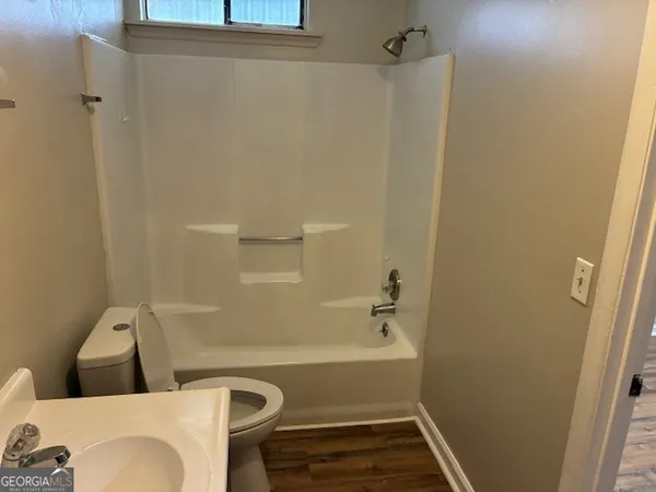 a bathroom with a sink and a tub