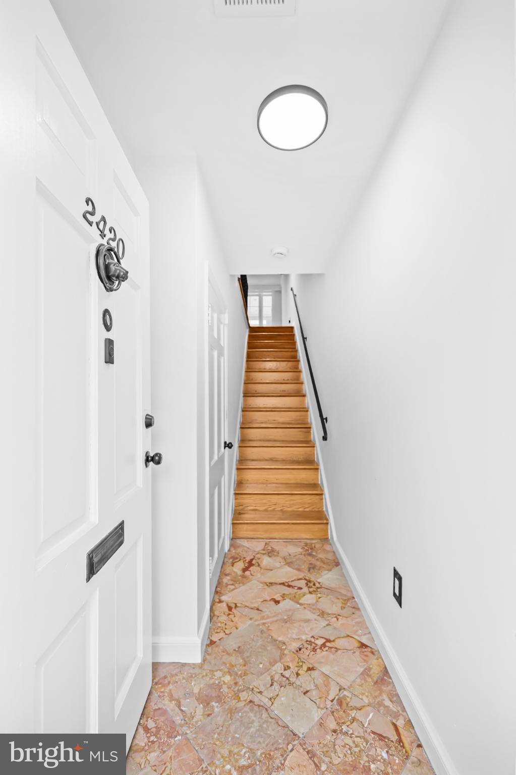 2420 I Street Northwest Washington, DC 20037 - Photo 6 of 50 a view of a hallway with wooden floor and entryway