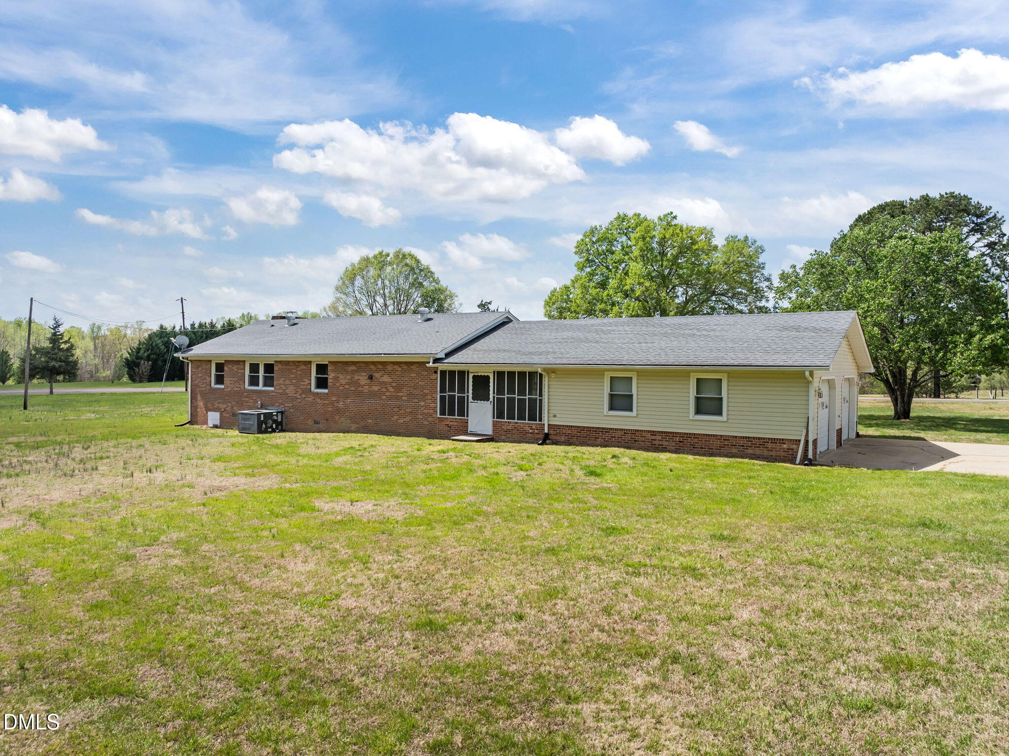 95 Harold Gill Road Roxboro, NC 27574 - Photo 38 of 53 a front view of a house with garden