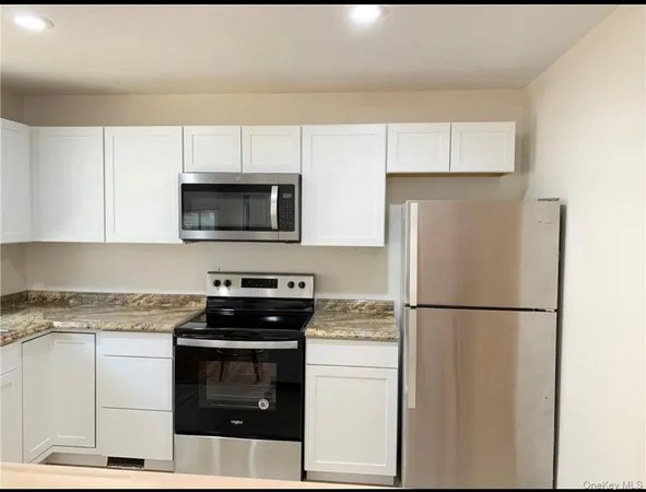 a view of a window in an empty room