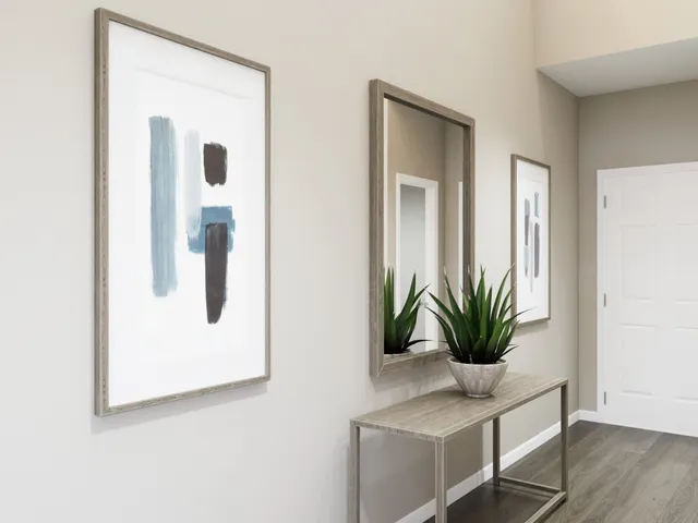 a bathroom with a granite countertop sink and a window