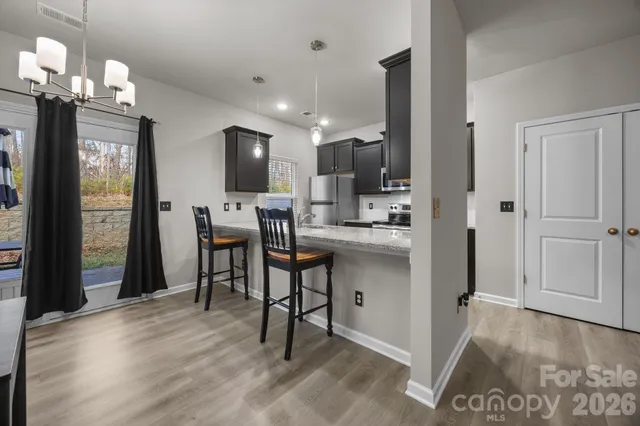 a view of a dining room with furniture