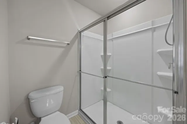 a bedroom with a bed and closet