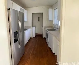 a bathroom with a sink and washing machine