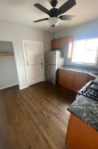 a view of a kitchen with a sink