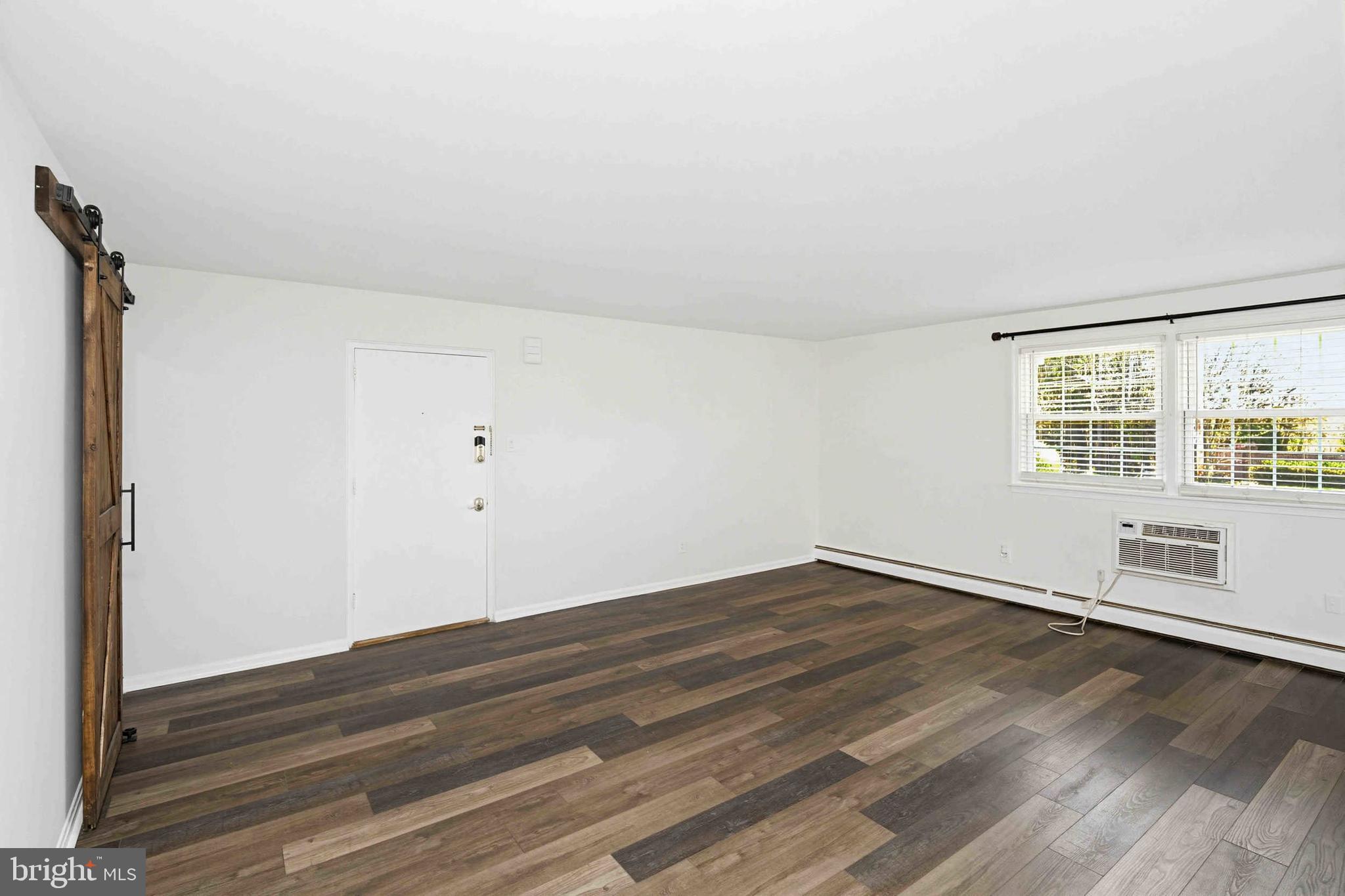 403 South Main Street, Unit S200 Doylestown, PA 18901 - Photo 23 of 26 wooden floor in an empty room