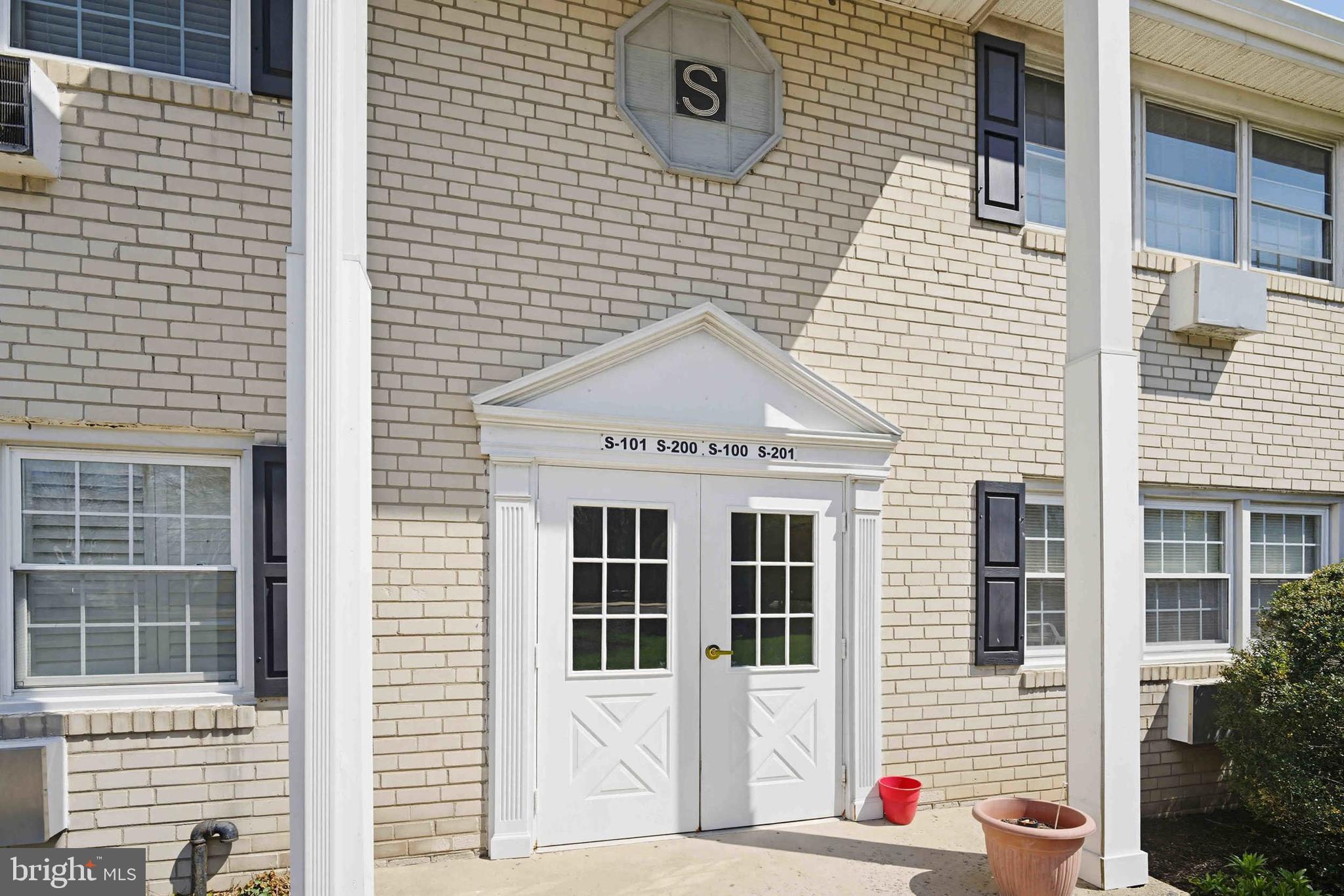 403 South Main Street, Unit S200 Doylestown, PA 18901 - Photo 4 of 26 a view of brick house with a window