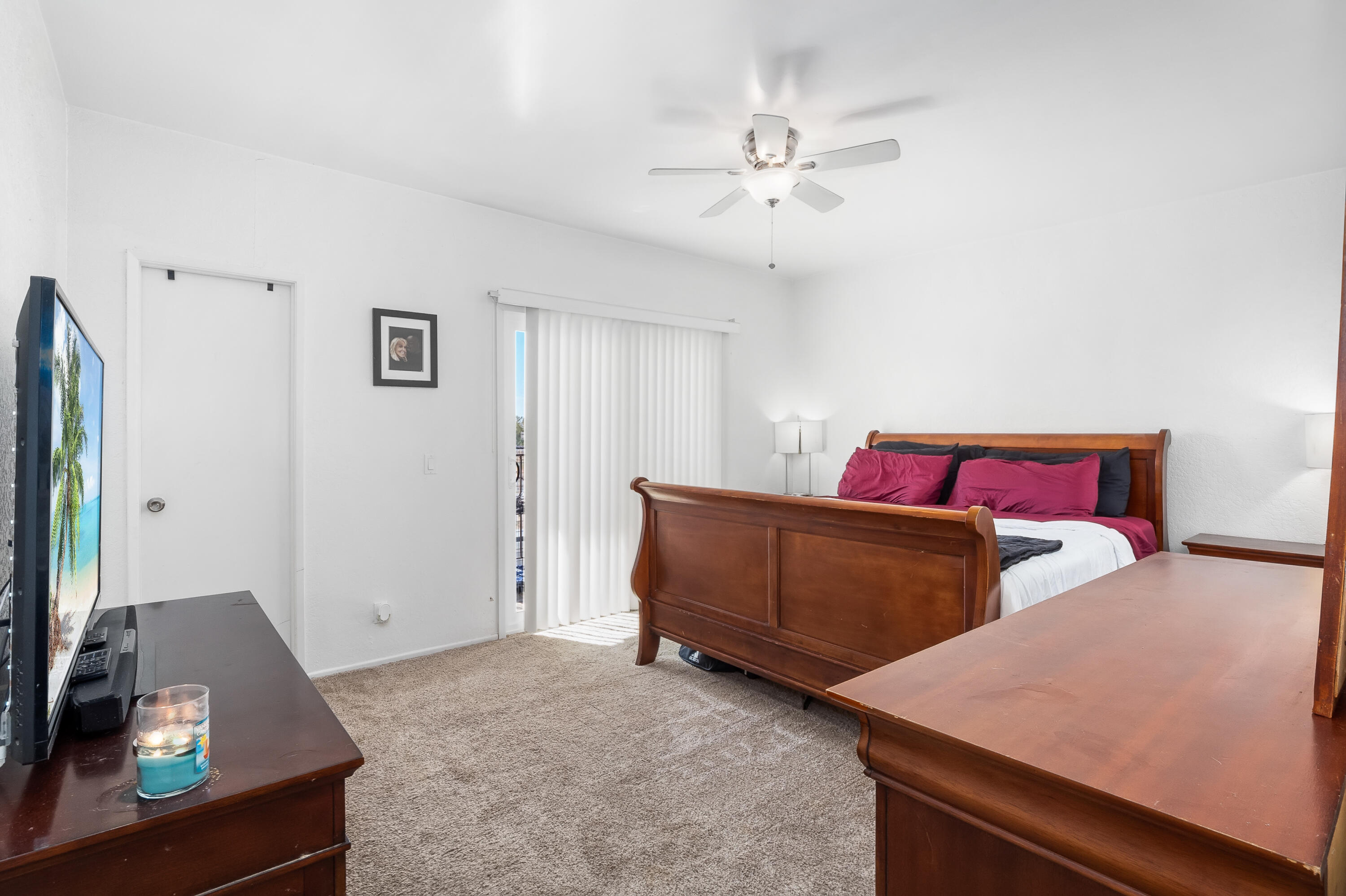 44200 Kingtree Avenue, Unit 24 Lancaster, CA 93534 - Photo 16 of 23 a bedroom with furniture and a dresser