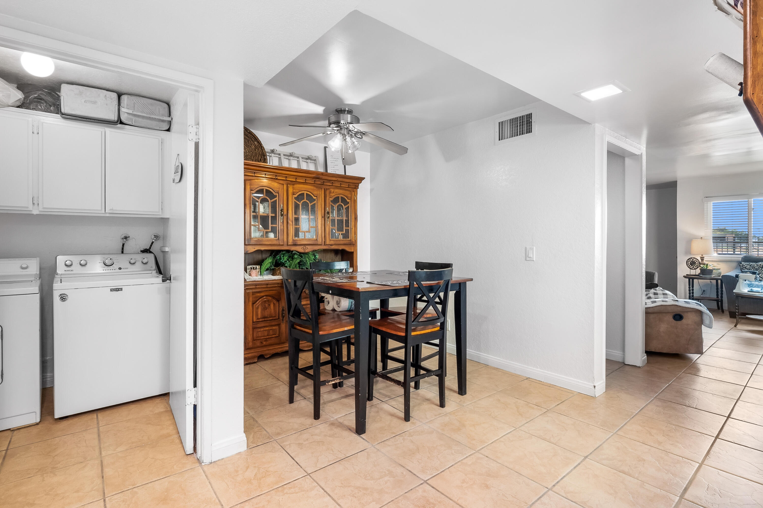 44200 Kingtree Avenue, Unit 24 Lancaster, CA 93534 - Photo 8 of 23 a view of a dining room with furniture