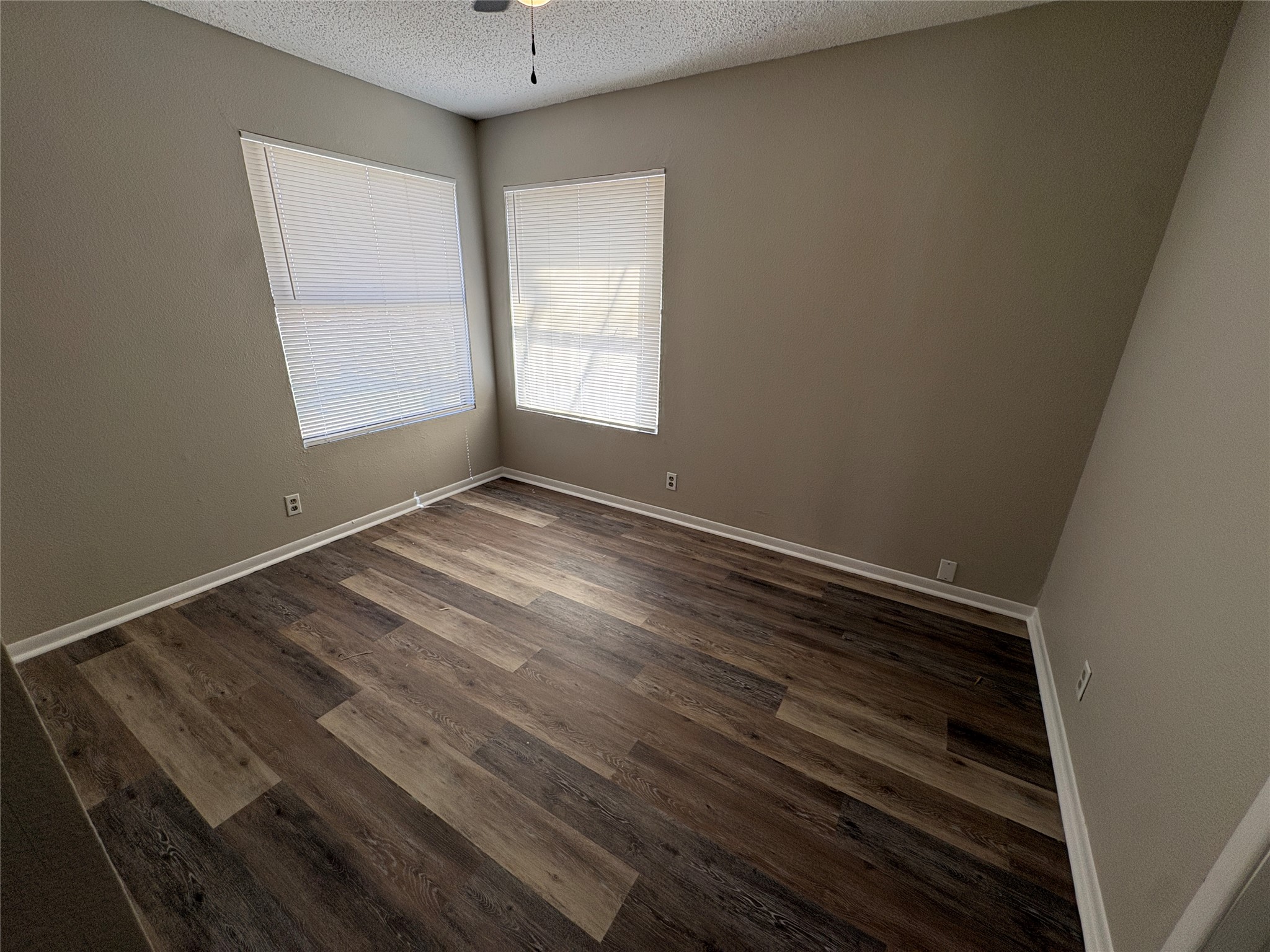 601 Valley Street San Marcos, TX 78666 - Photo 9 of 10 an empty room with windows