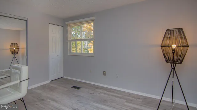 a view of a livingroom with furniture and window