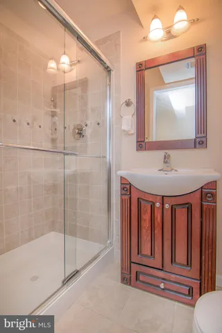 a patio with a table and chairs