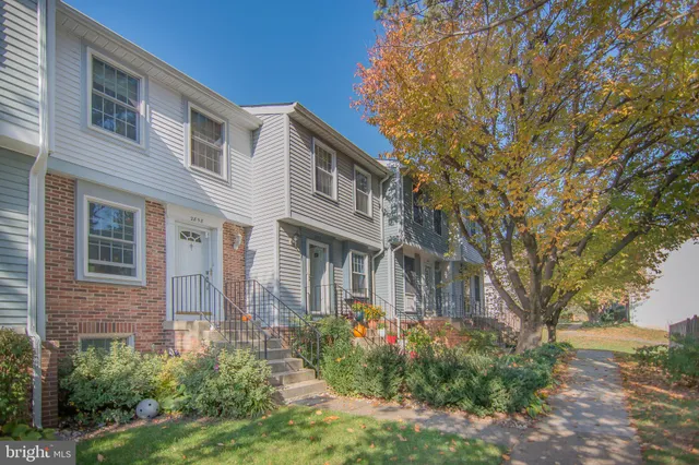 a view of a building with a yard