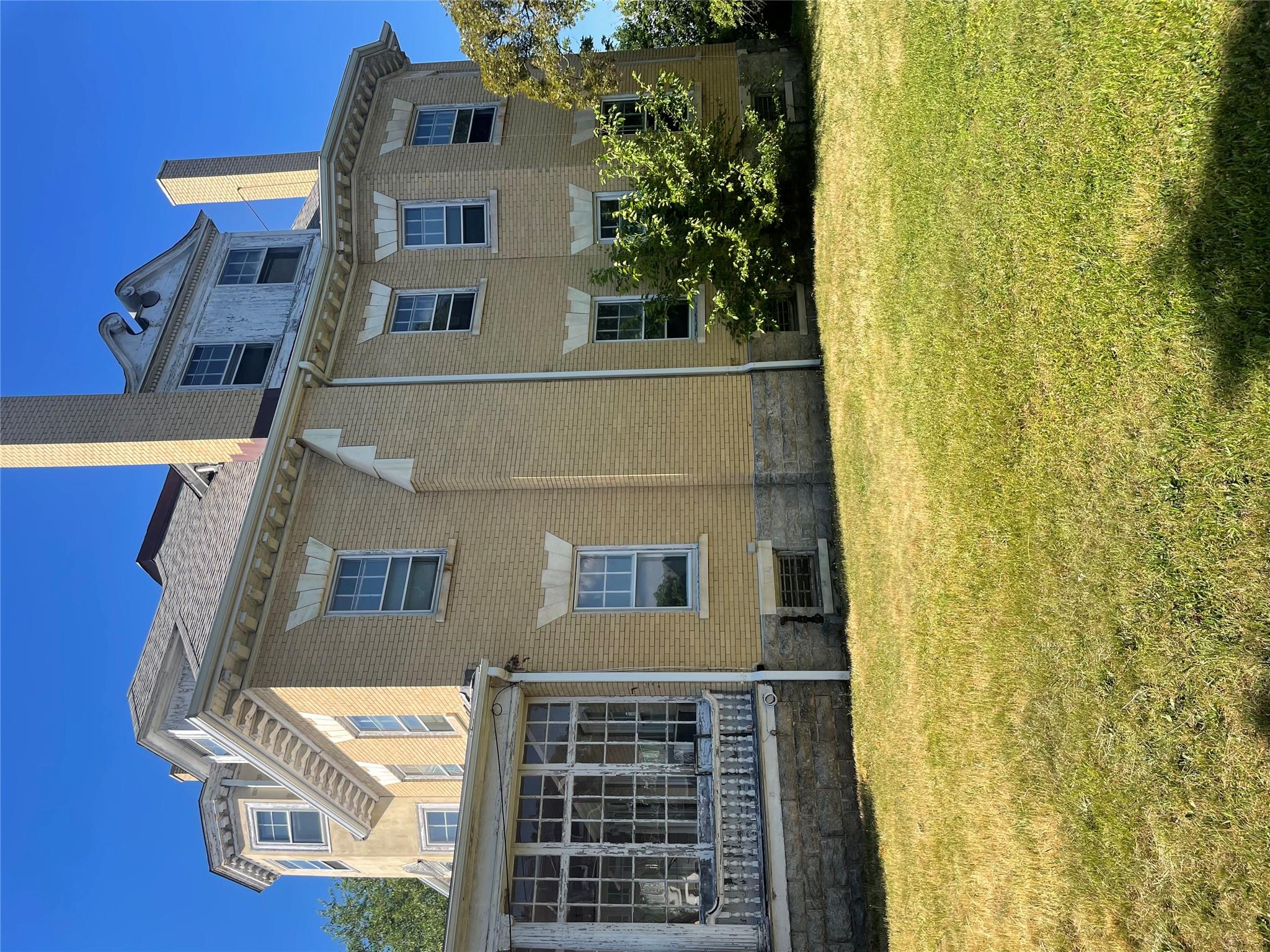 165 Summit Avenue Mount Vernon, NY 10550 - Photo 3 of 3 a front view of house with yard