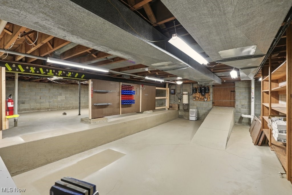 8304 Montello Road Independence, OH 44131 - Photo 29 of 45 Lower level workshop and storage area with outside access
