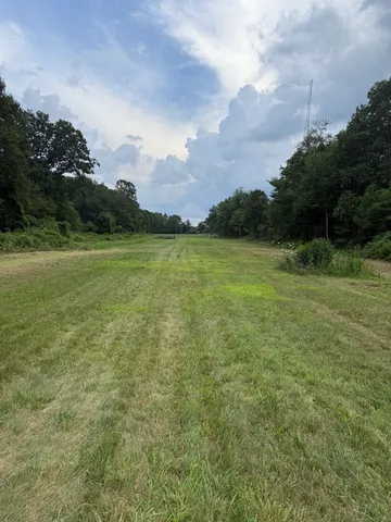 a view of outdoor space and yard