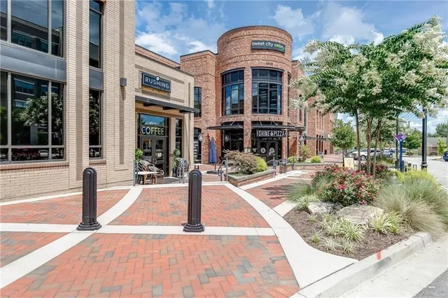 a aerial view of a house with a yard