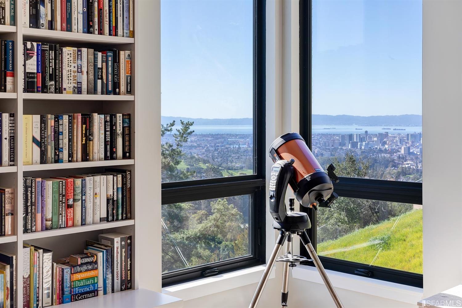 1538 Grand View Drive Berkeley, CA 94705 - Photo 18 of 30 a view of a living room and a book shelf