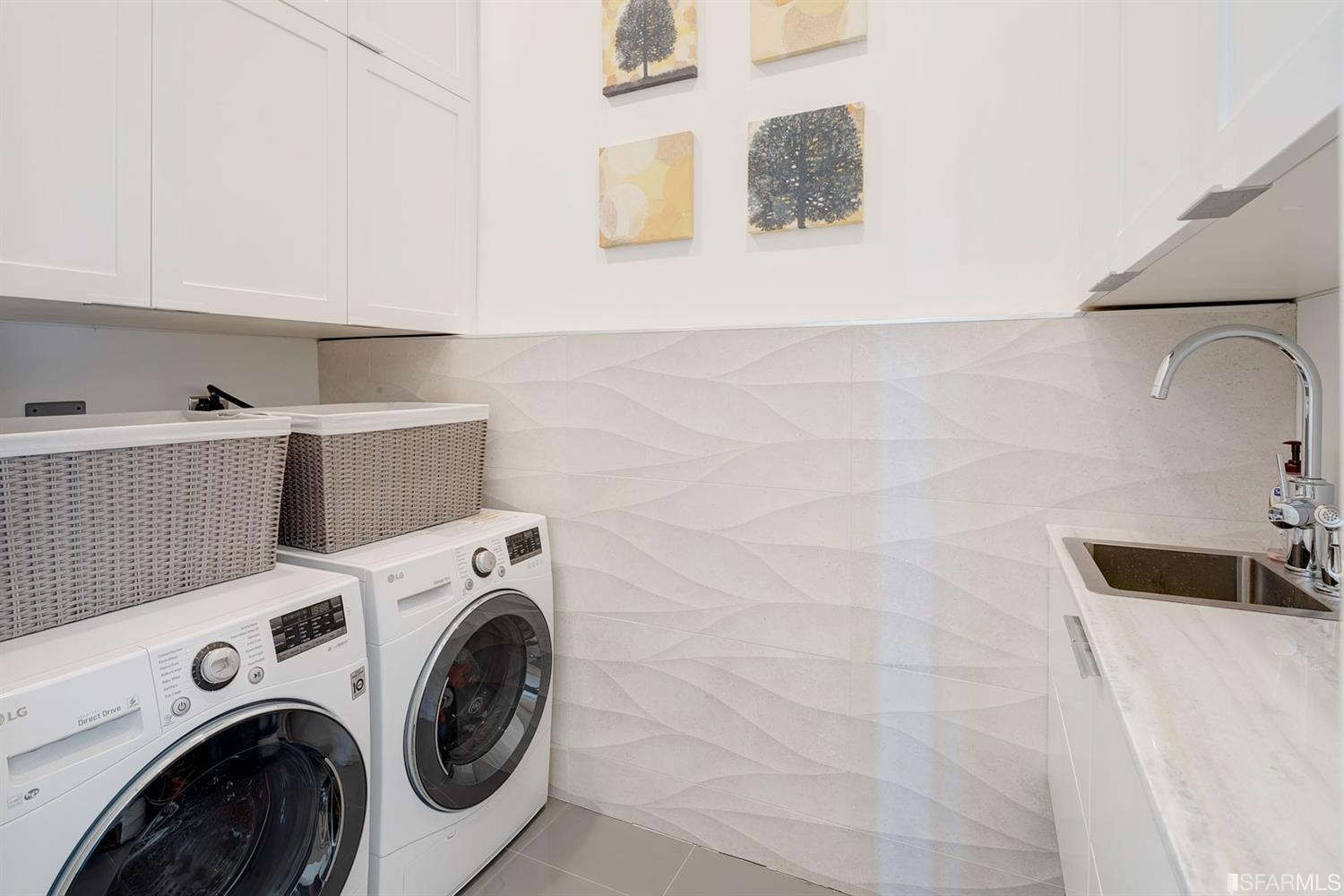 1538 Grand View Drive Berkeley, CA 94705 - Photo 26 of 30 a utility room with dryer and washer