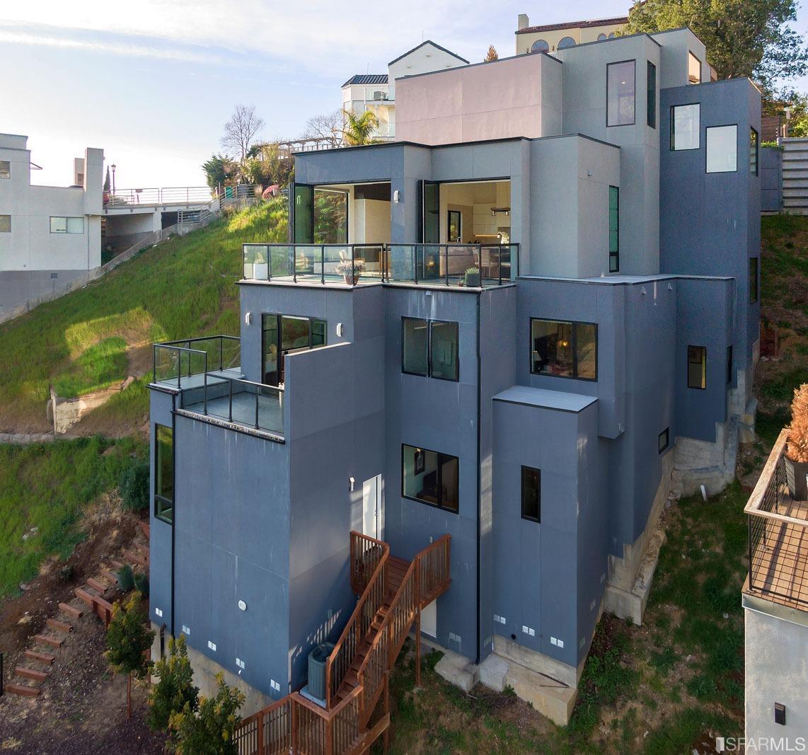 1538 Grand View Drive Berkeley, CA 94705 - Photo 28 of 30 a aerial view of a house with a yard