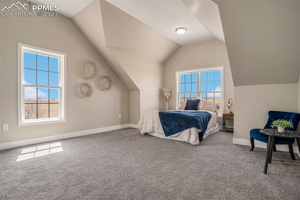 11615 Oil Well Road Calhan, CO 80808 - Photo 17 of 37 a living room with furniture and a window