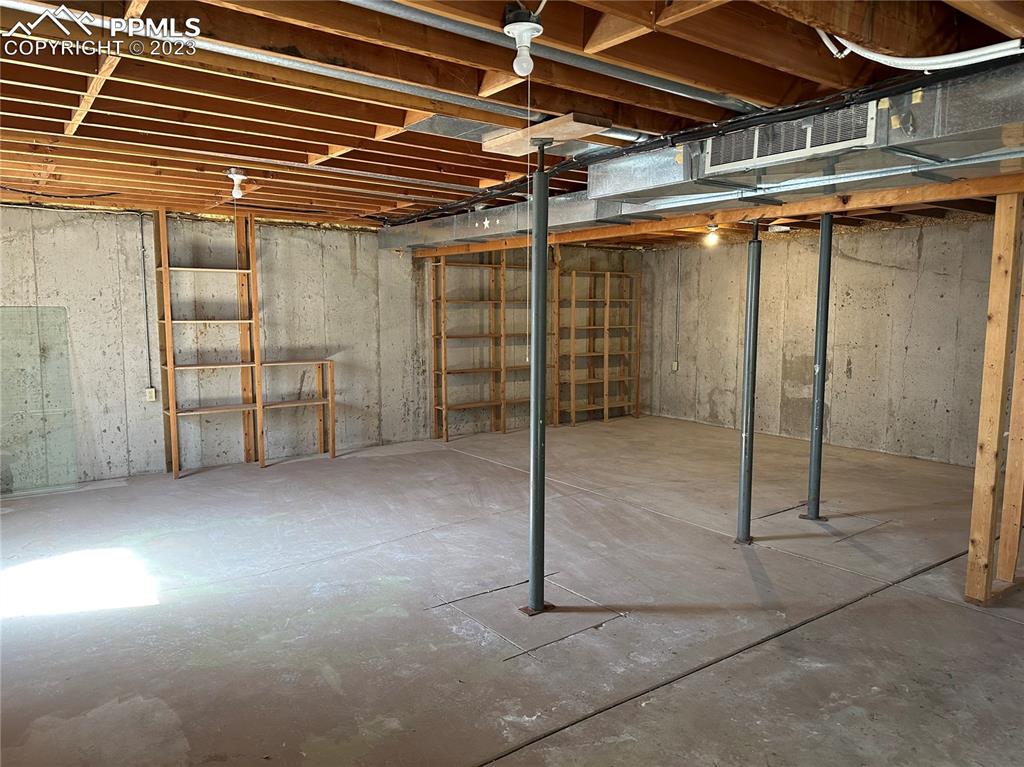 11615 Oil Well Road Calhan, CO 80808 - Photo 28 of 37 a view of a room with wooden walls