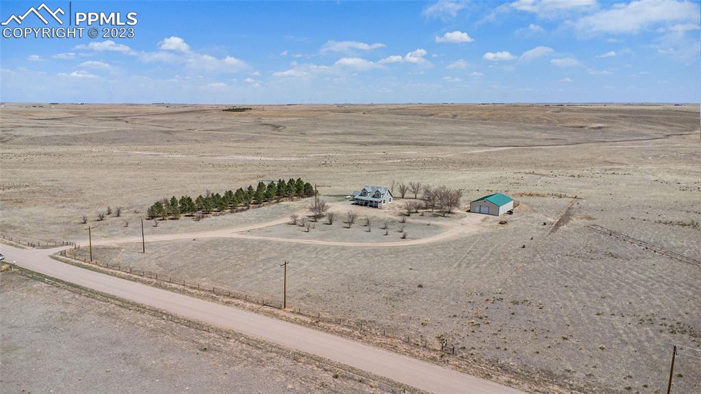 11615 Oil Well Road Calhan, CO 80808 - Photo 36 of 37 a view of a lake with a beach
