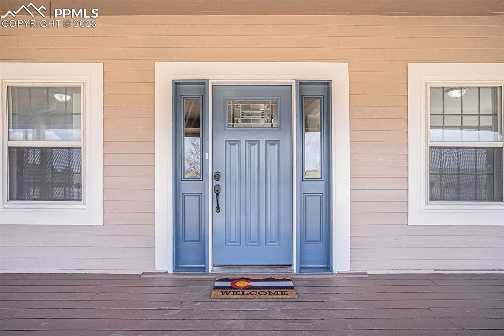 11615 Oil Well Road Calhan, CO 80808 - Photo 5 of 37 a view of front door of house