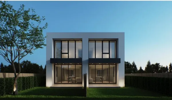 a view of a house with backyard