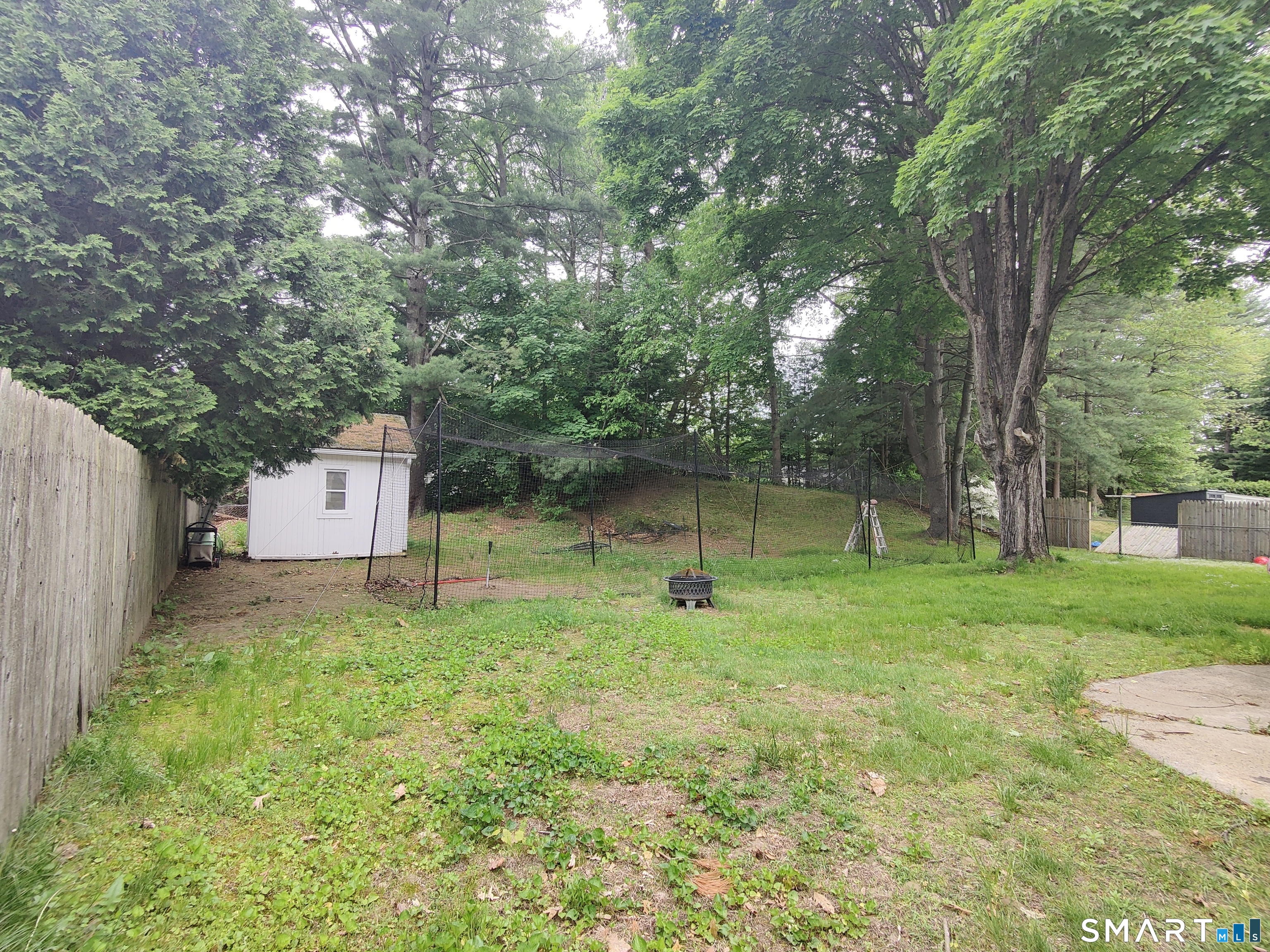 35 Brook Road Enfield, CT 06082 - Photo 23 of 25 a house in middle of the forest