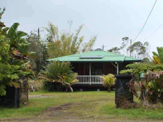 11-3108 Kahaualea Road Volcano, HI 96771 - Photo 1 of 25 a front view of a house having patio yard