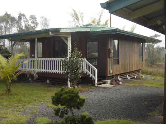 11-3108 Kahaualea Road Volcano, HI 96771 - Photo 3 of 25 a view of a house with a yard and sitting area
