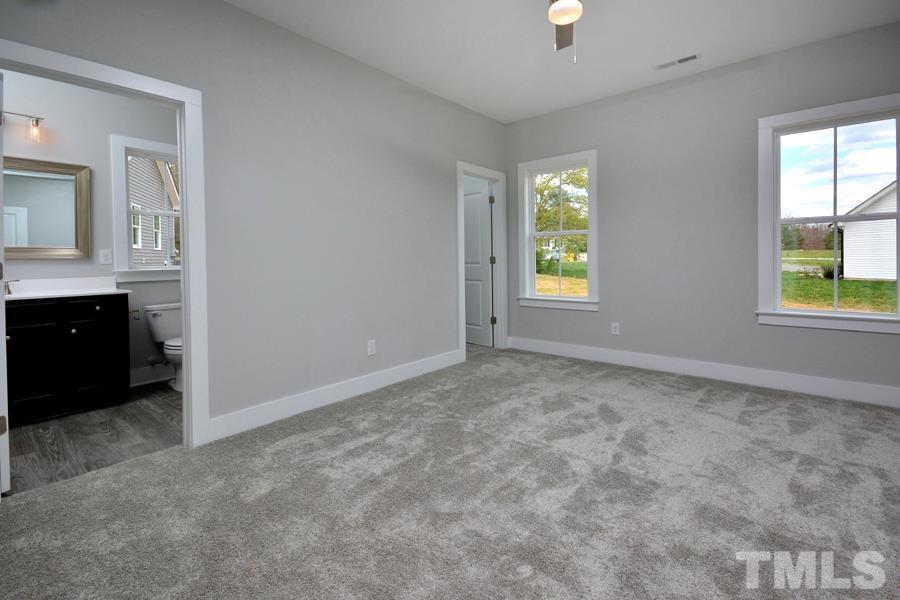 100 Southern Middle School Road Roxboro, NC 27573 - Photo 23 of 28 a view of an empty room with window and bathroom