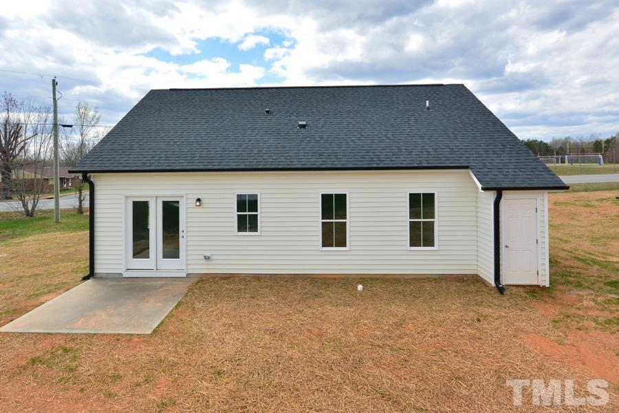 100 Southern Middle School Road Roxboro, NC 27573 - Photo 4 of 28 a front view of a house with a yard