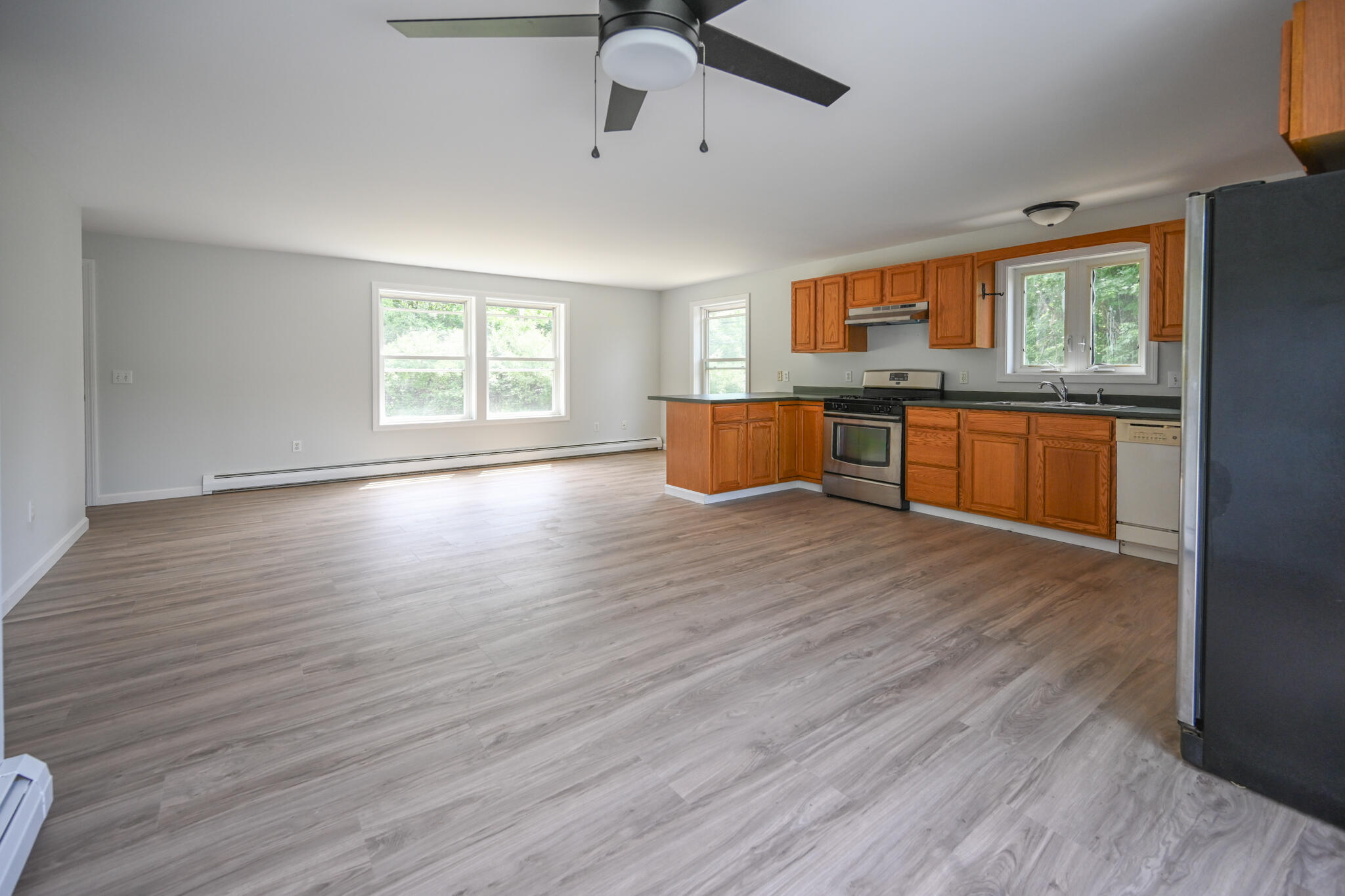 6 Garlands Way Limington, ME 04049 - Photo 15 of 46 Open kitchen, dining, living space