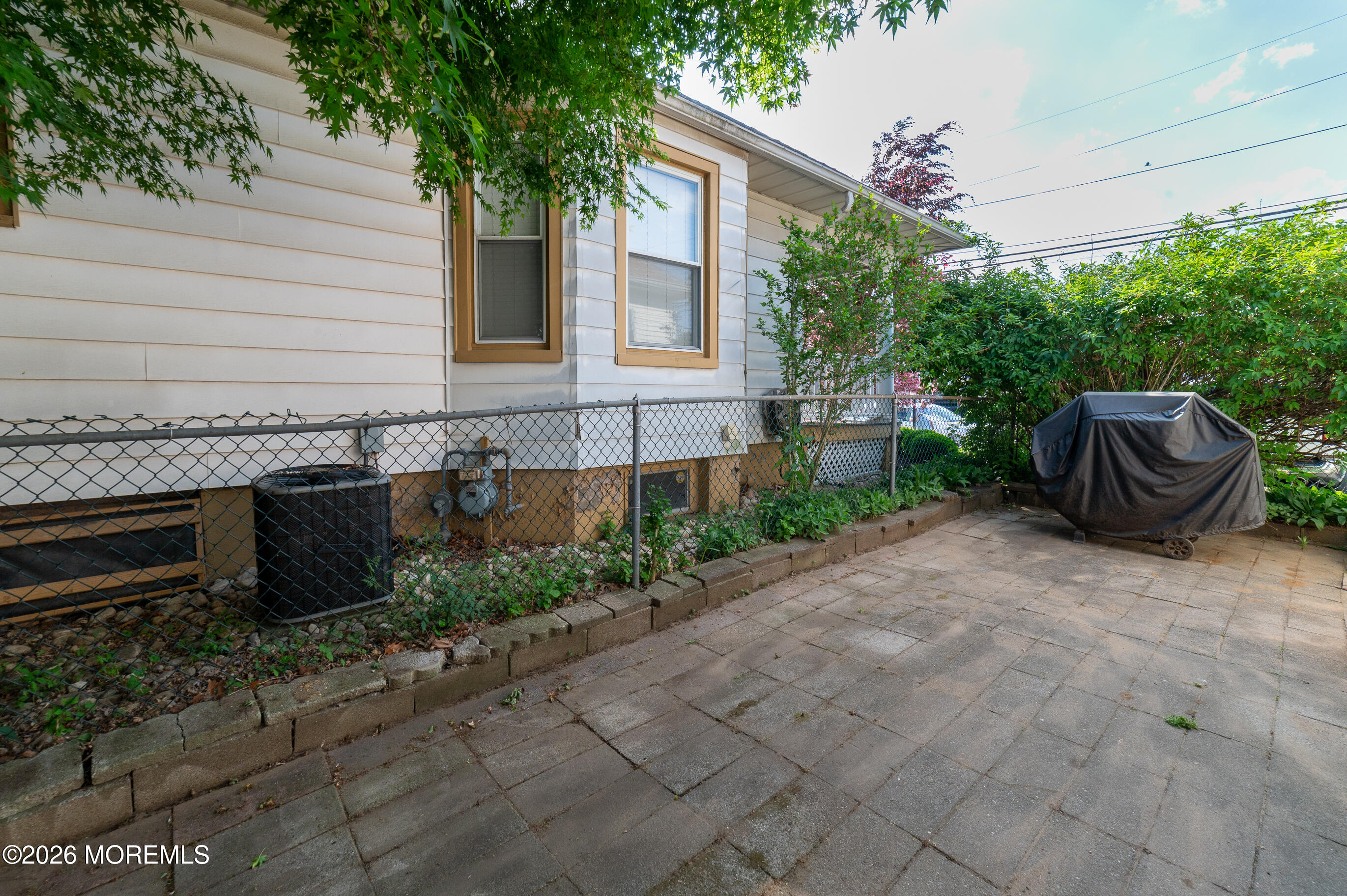 38 Walnut Street Keyport, NJ 07735 - Photo 5 of 19 a front view of a house with a garden