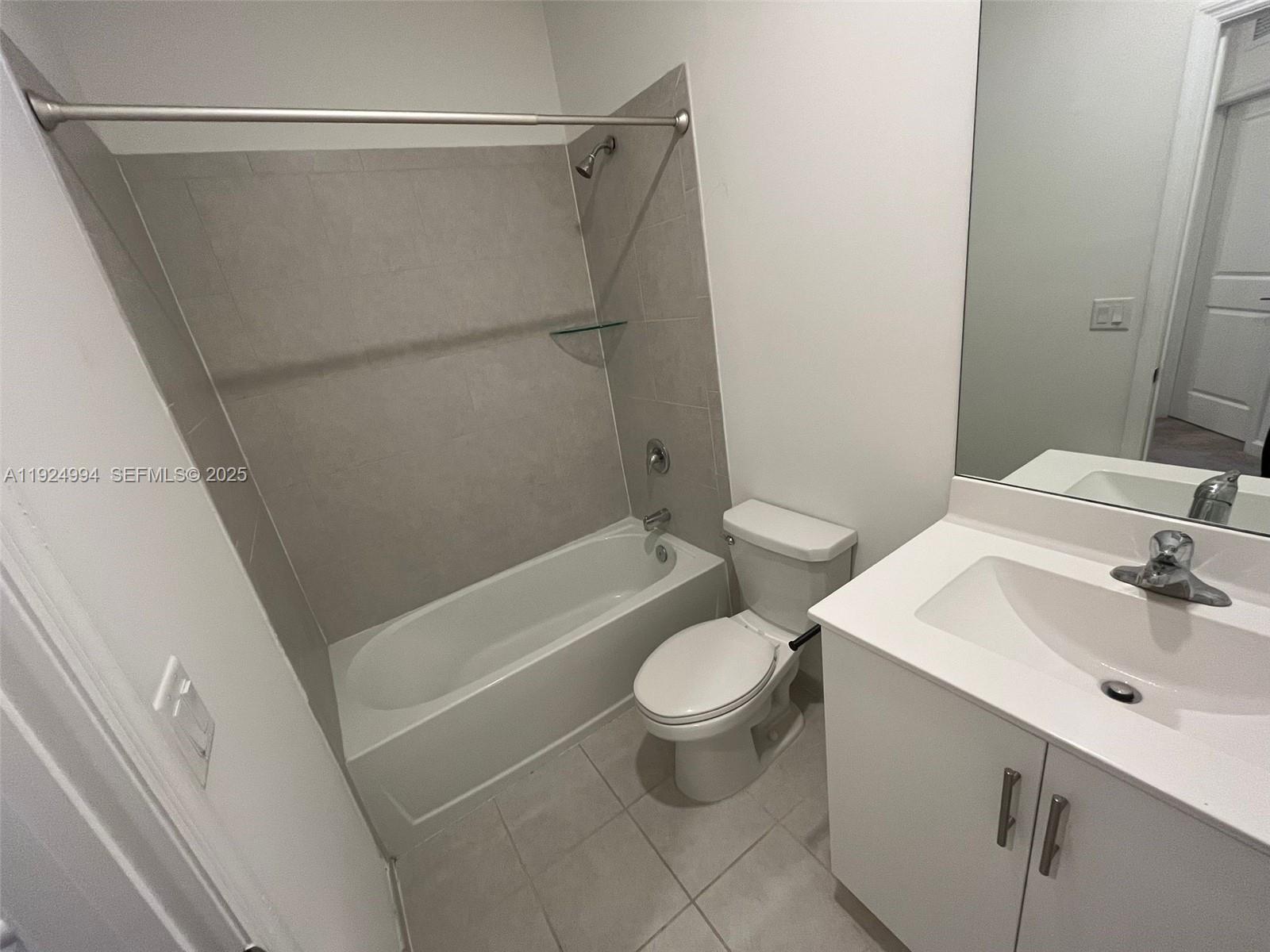 2602 Southeast 11th Street Homestead, FL 33035 - Photo 20 of 26 a bathroom with a sink toilet and shower