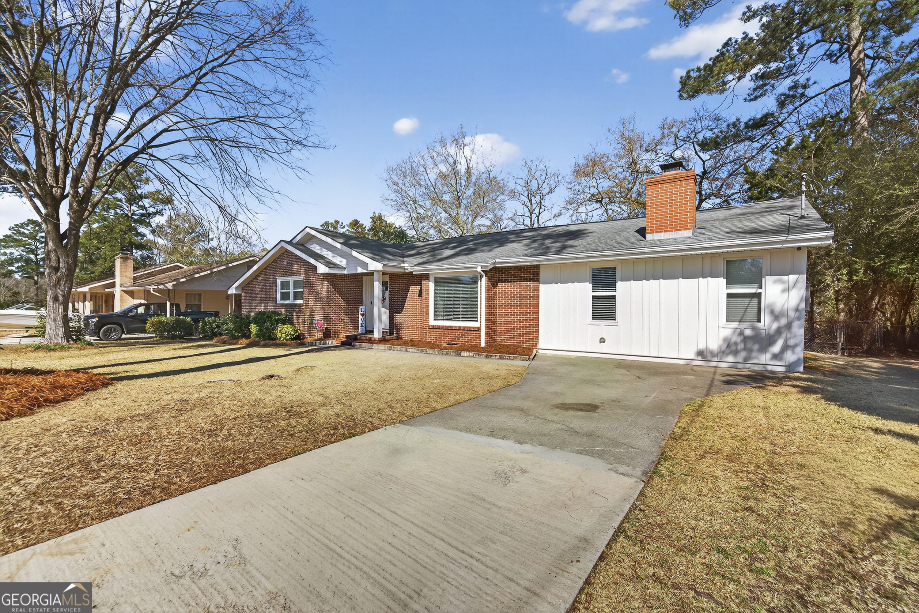 front view of a house with a yard