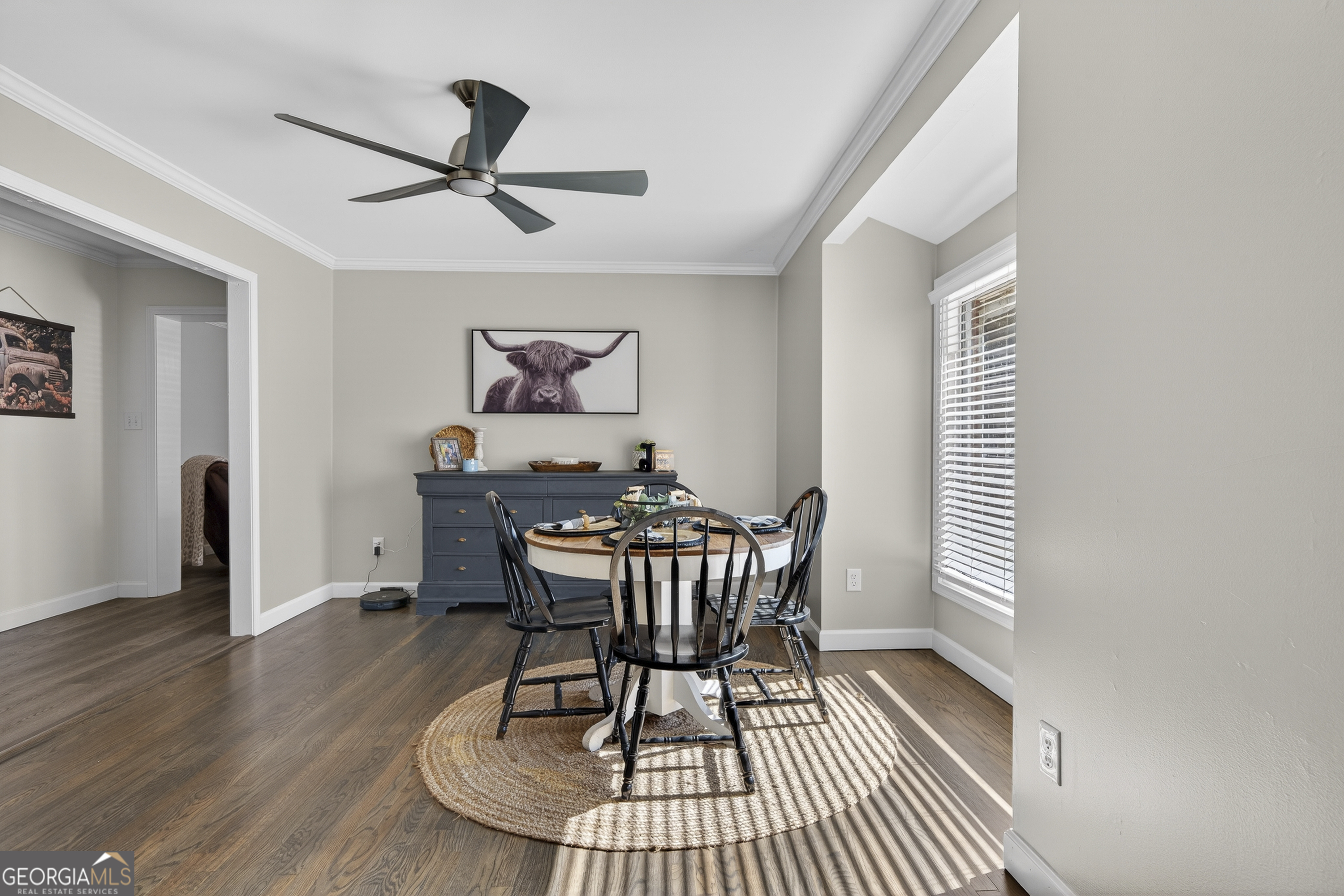 1739 Elmwood Road Milledgeville, GA 31061 - Photo 22 of 41 a view of a dining room with furniture and wooden floor