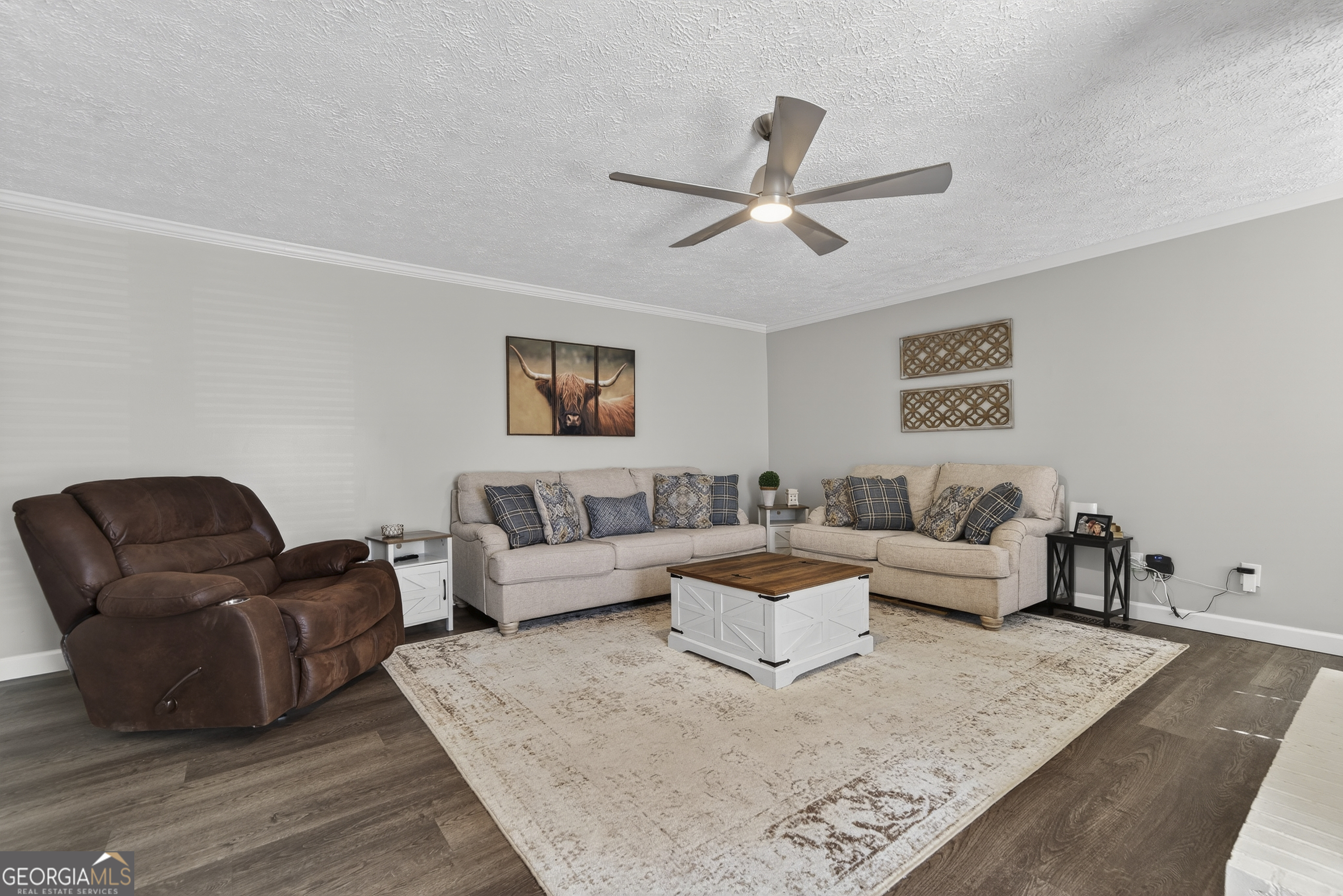 1739 Elmwood Road Milledgeville, GA 31061 - Photo 33 of 41 a living room with furniture and a rug