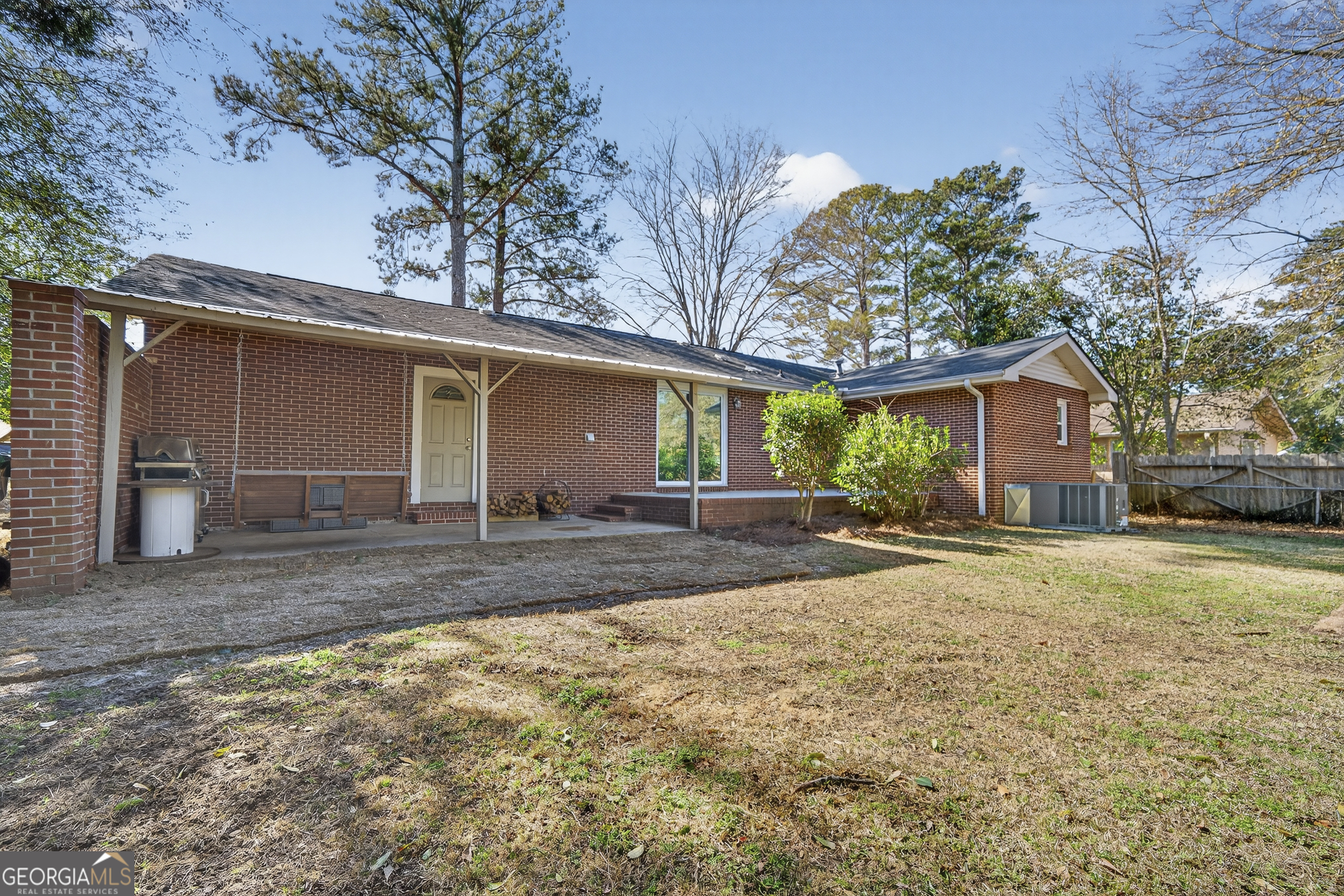 1739 Elmwood Road Milledgeville, GA 31061 - Photo 38 of 41 a view of a house with a yard and garage