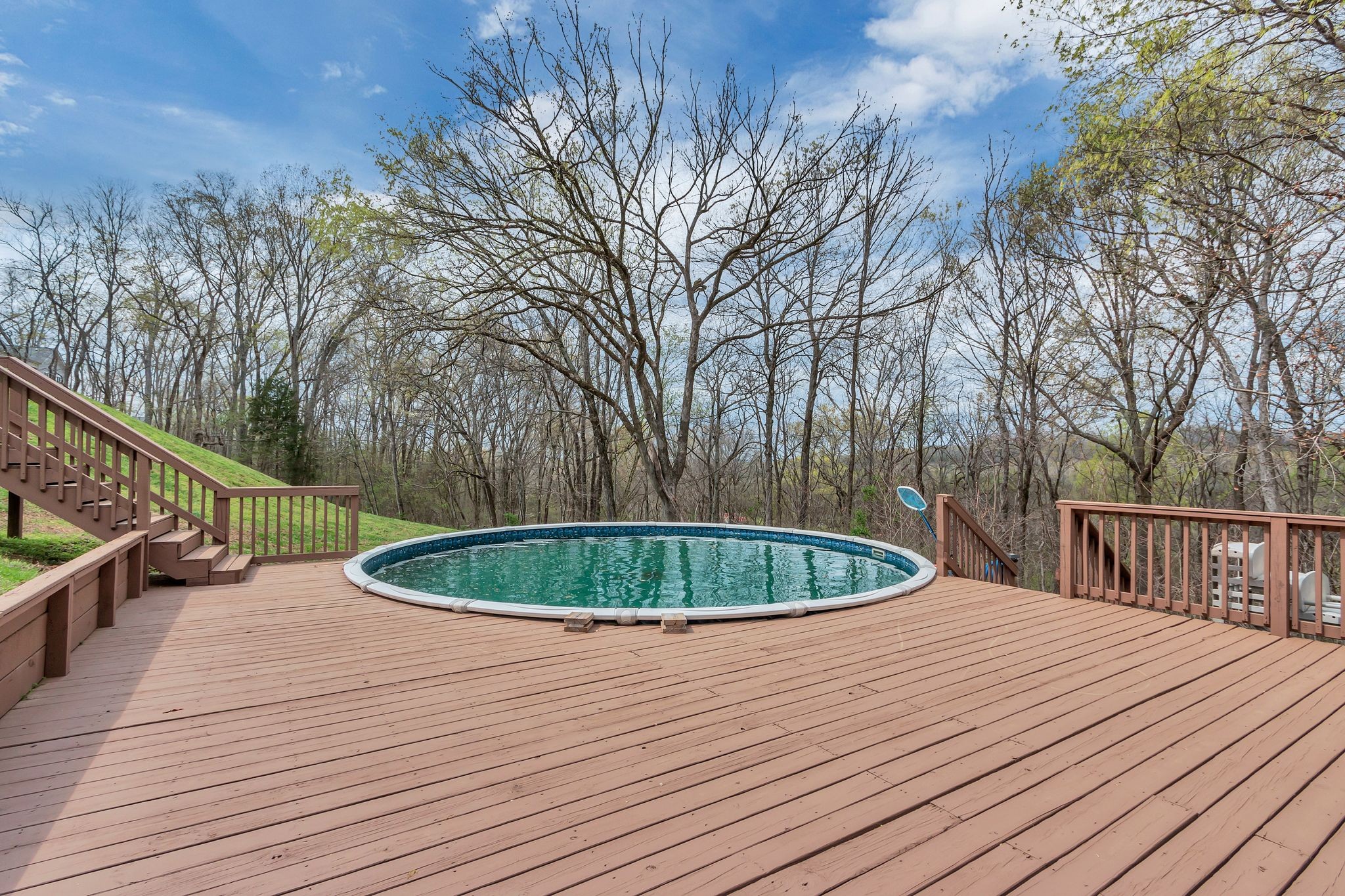 1552 Heller Ridge Spring Hill, TN 37174 - Photo 53 of 53 a table and chair sitting in middle of a yard